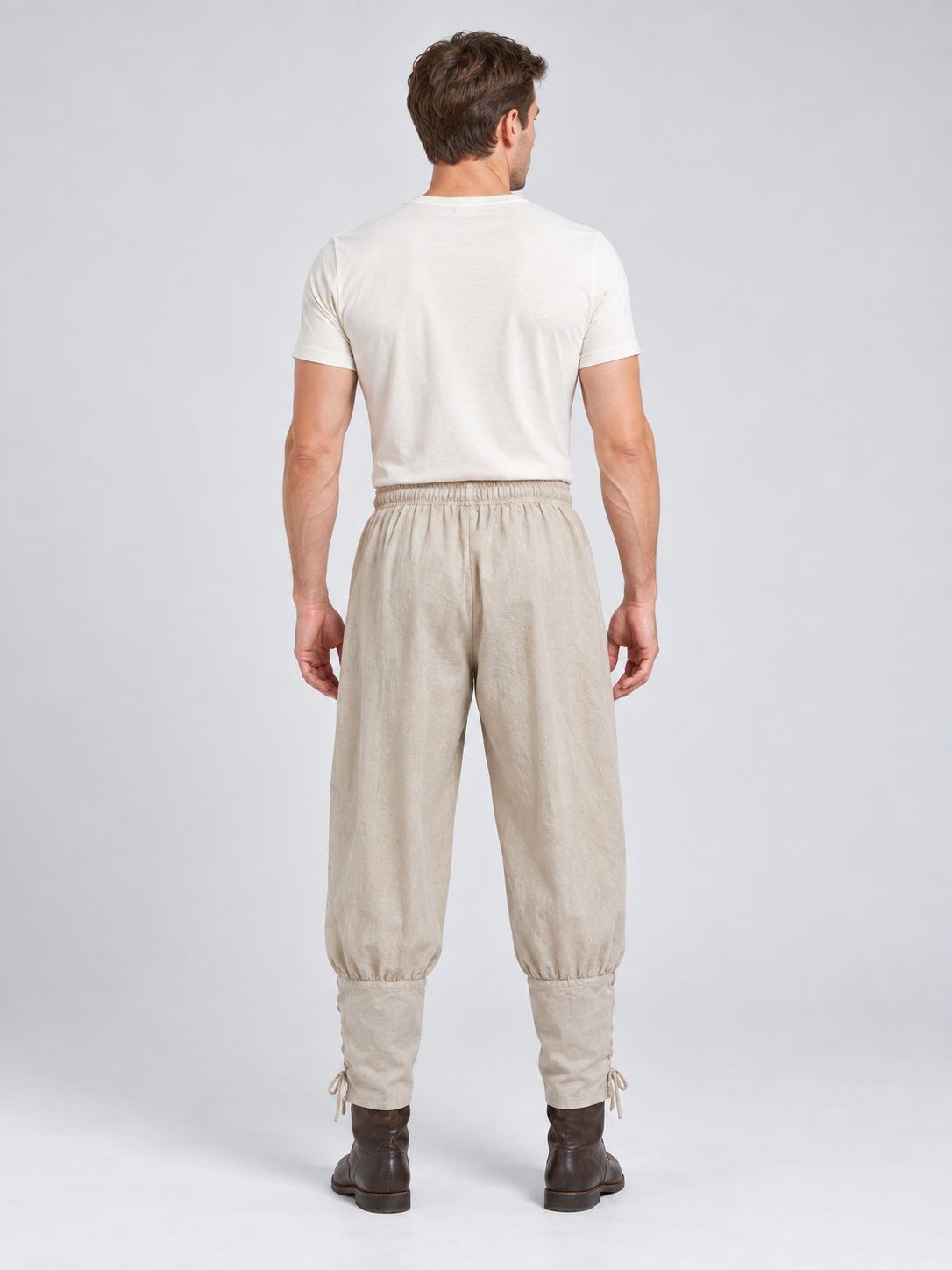 Beige long loose pants with ties at the cuffs
