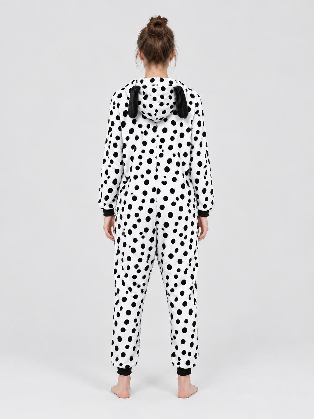 White pajama jumpsuit with black spots and ears