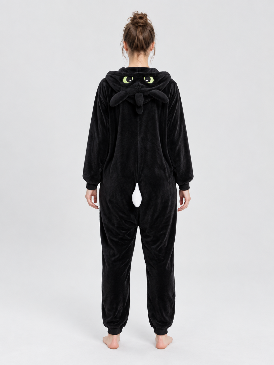 Black and white pajama jumpsuit with a hood and ears