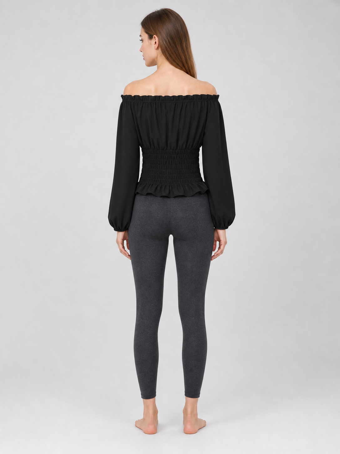 Black off-the-shoulder blouse with ruffles