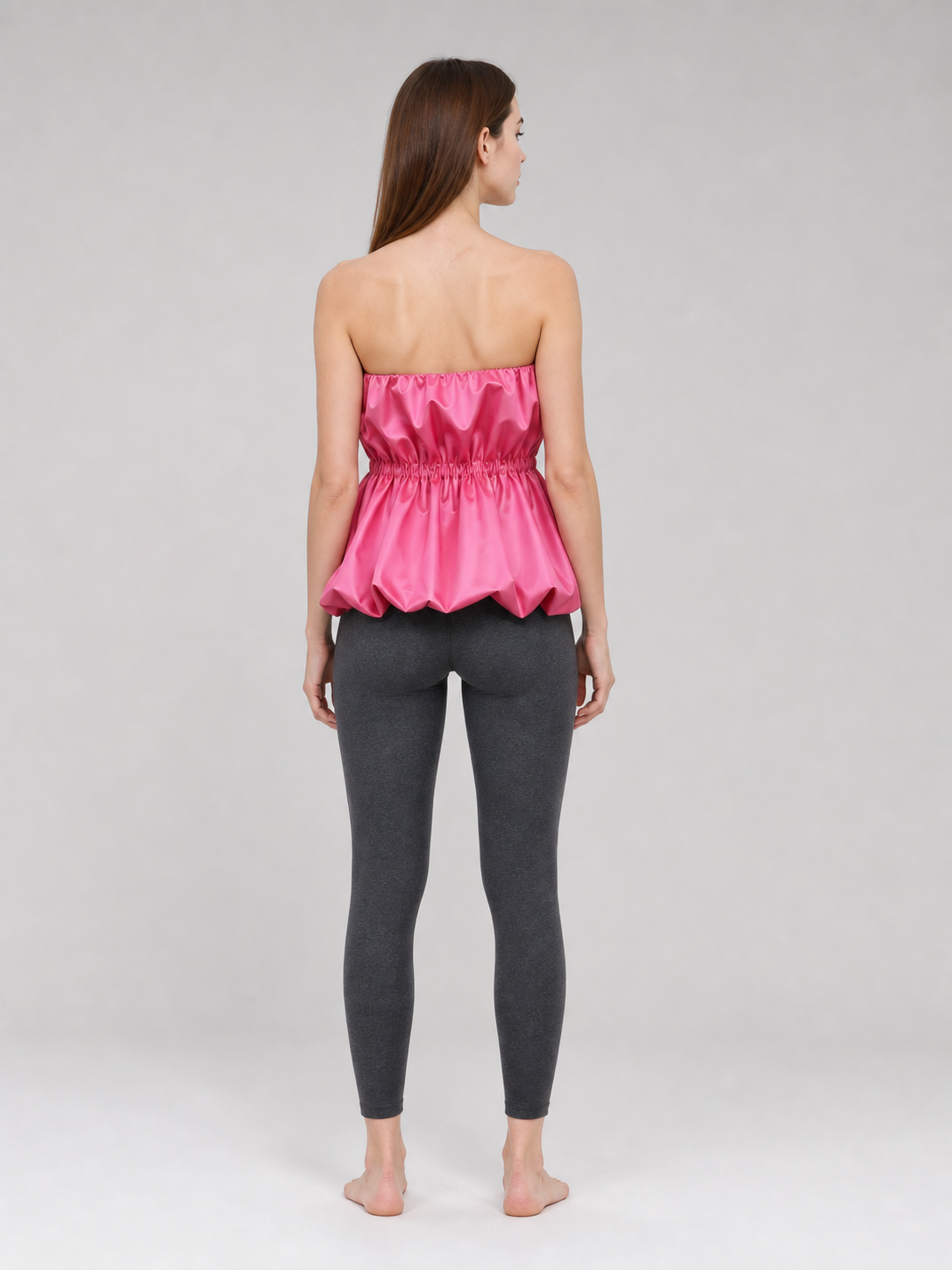 Strapless bustier top with peplum, bright pink