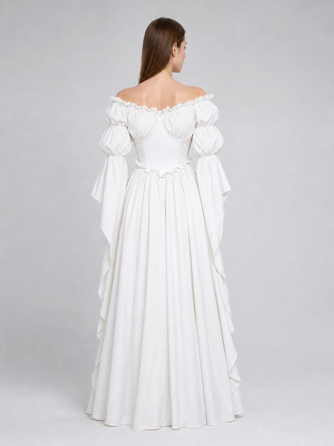 White vintage-style dress with puff sleeves