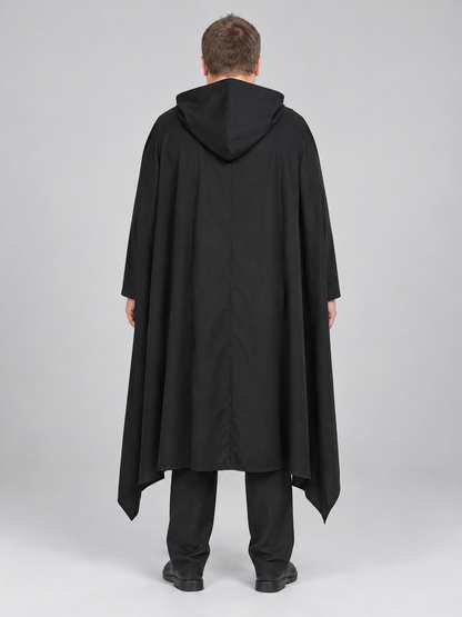 Black costume with white cross, hood, and belt