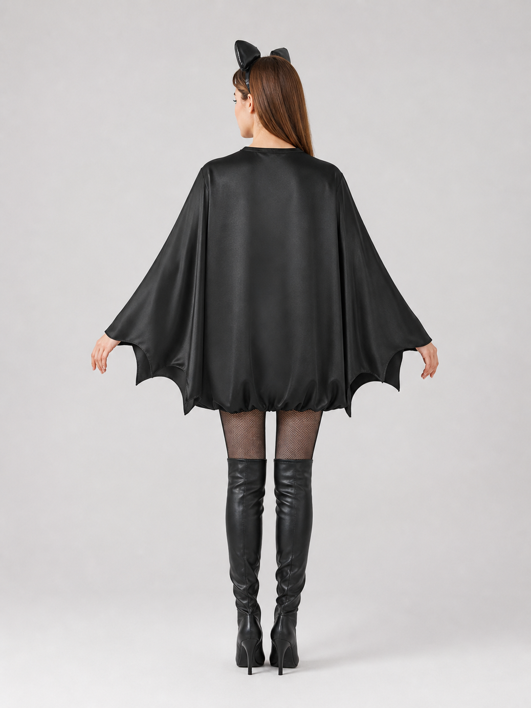 Black bat costume dress with a headband and ears for themed events. The design