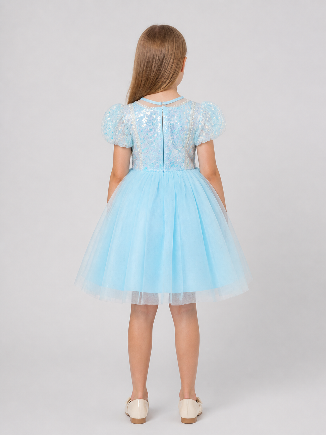 Party Dress with Sequins, a Full Skirt, and a Bow