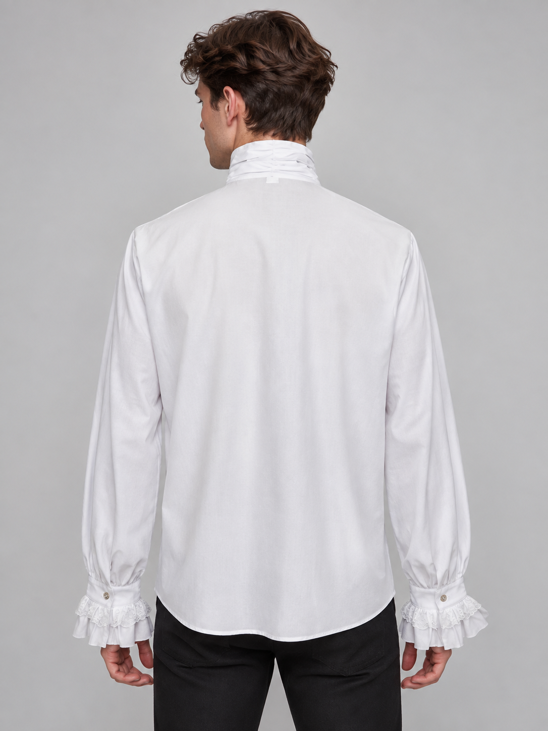 White shirt with a jabot, ruffles and a high collar