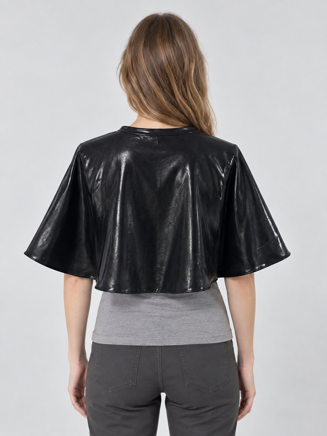 Short black shiny cape with ties