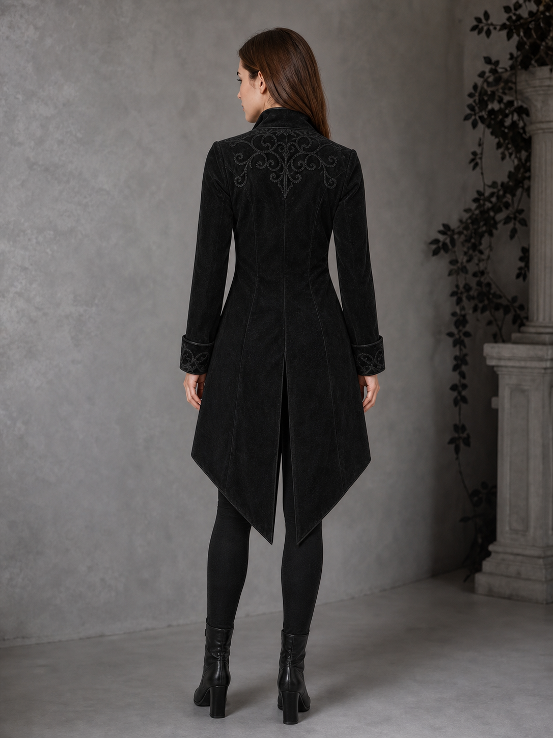 Black embroidered coat with a stand-up collar and pointed tails