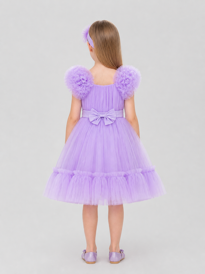 Festive Tulle Dress with a Full Skirt and Bow back view