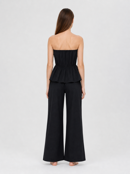 Black bandeau dress with a ruched bodice