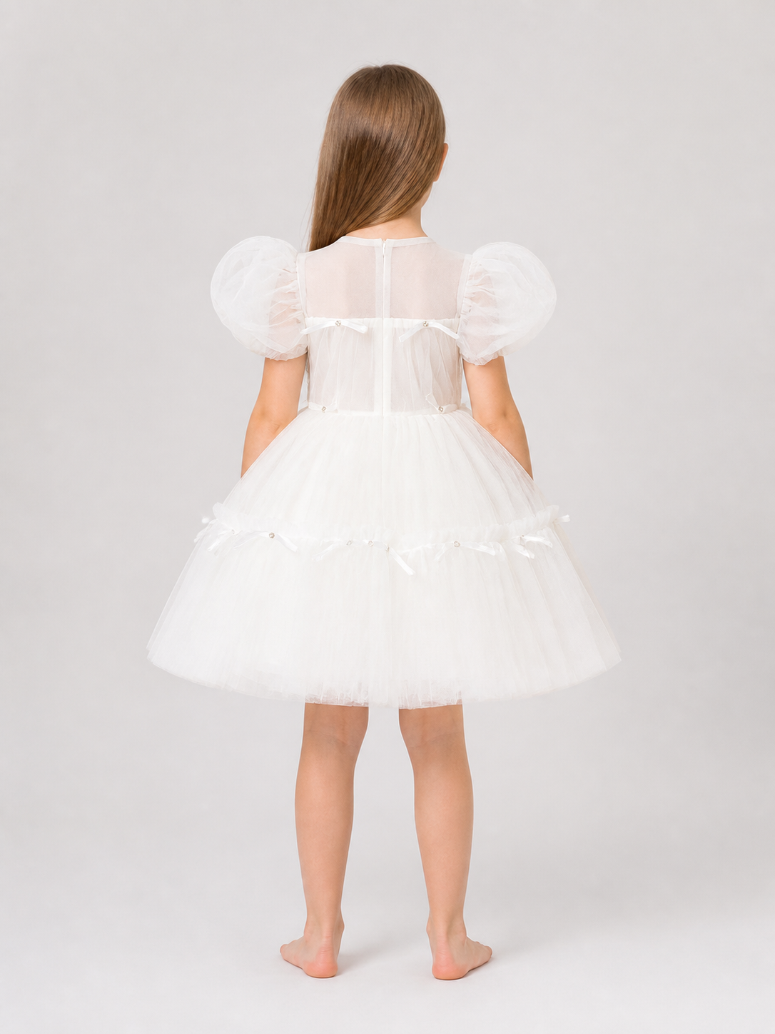 White Princess Dress with a Full Skirt and Bows back view