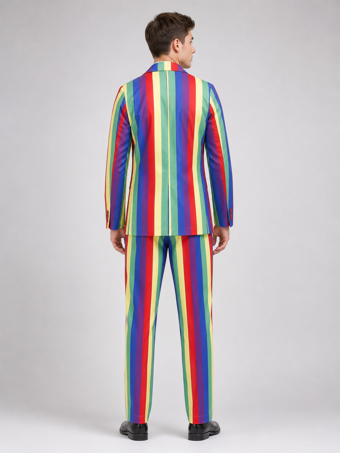 Striped multicolor blazer and pants set—a bold choice for a festive look