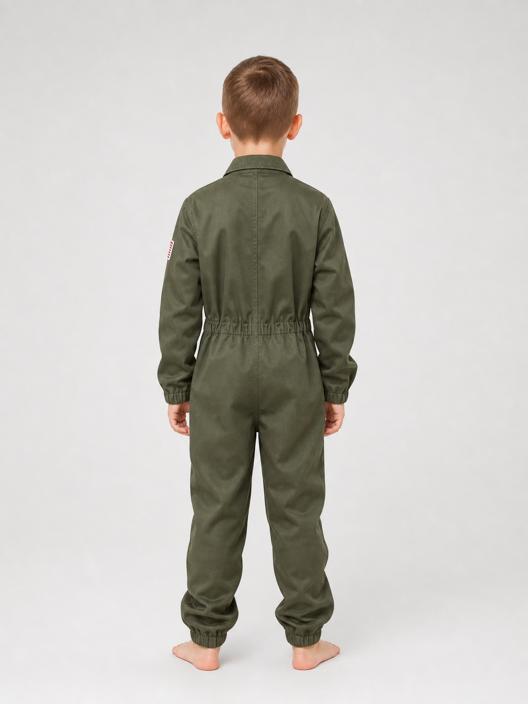 Flight jumpsuit with patches and accessories