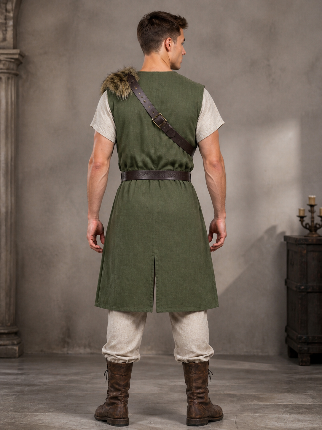Back view of a green sleeveless vest with fur shoulder trim, brown belt and center back slit in a dim interior