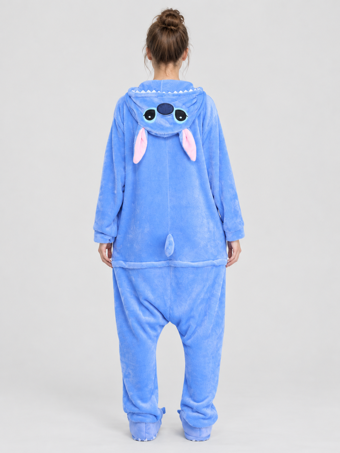 Blue pajama jumpsuit with a hood, ears, and tail