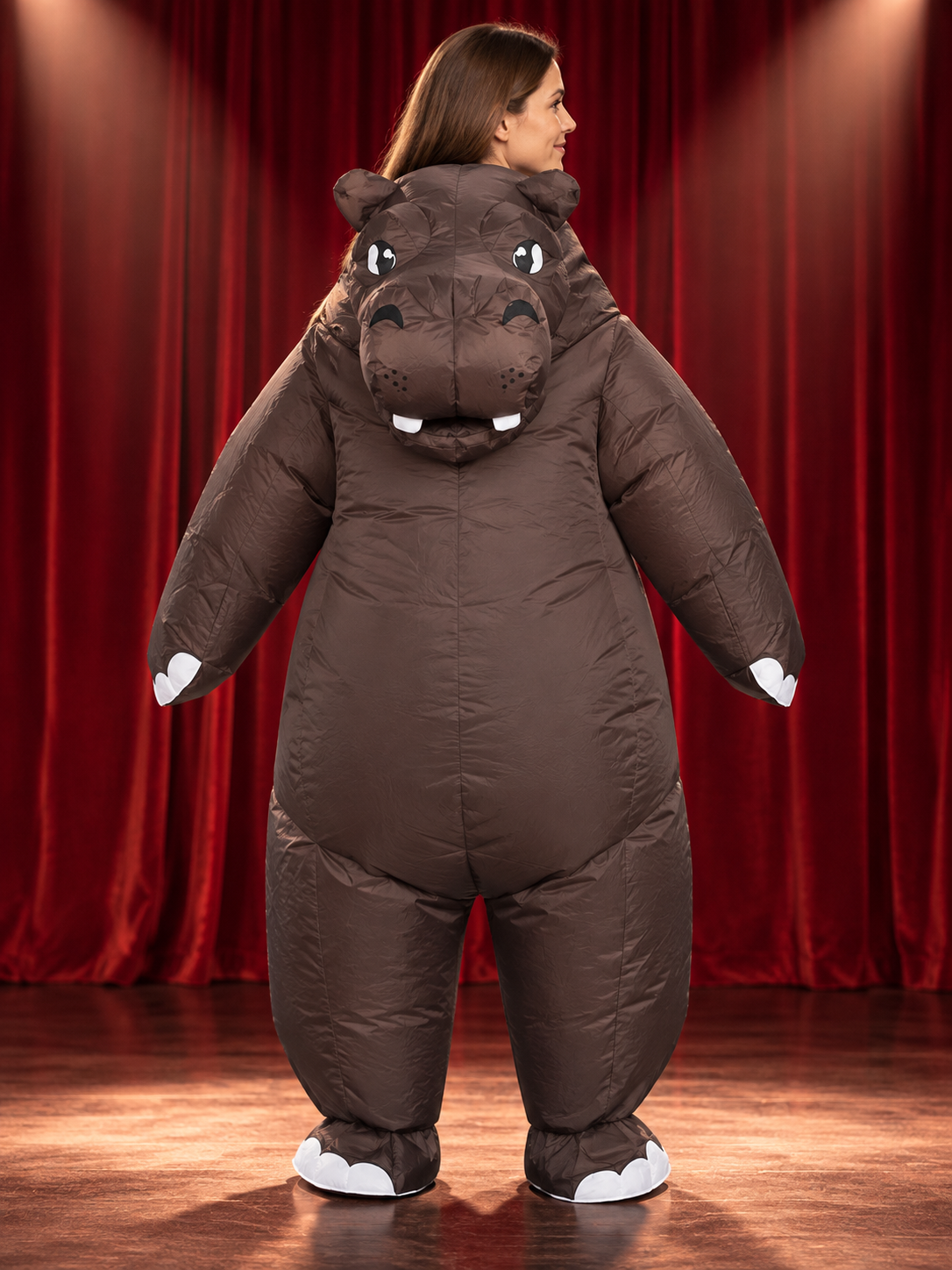 Inflatable hippo costume with white fangs and an open mouth