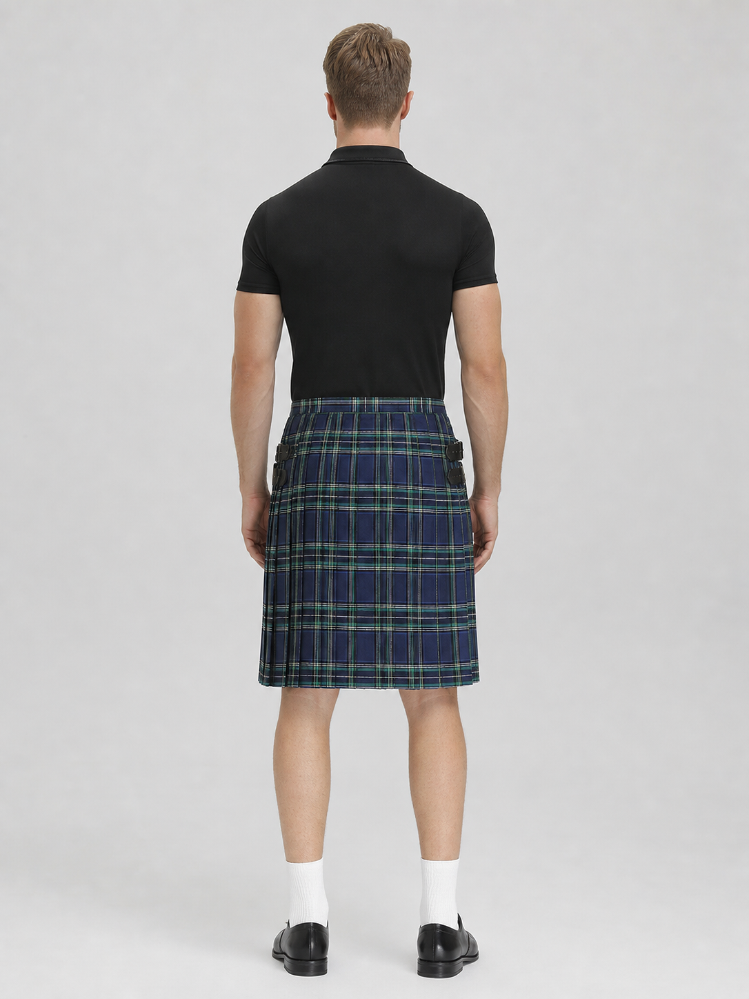 The plaid skirt is designed in a Scottish style and decorated with a crisscross pattern in blue and white, green, and black. Plaid runs across the entire surface of the garment, creating a distinctive, recognizable look. The skirt has a str