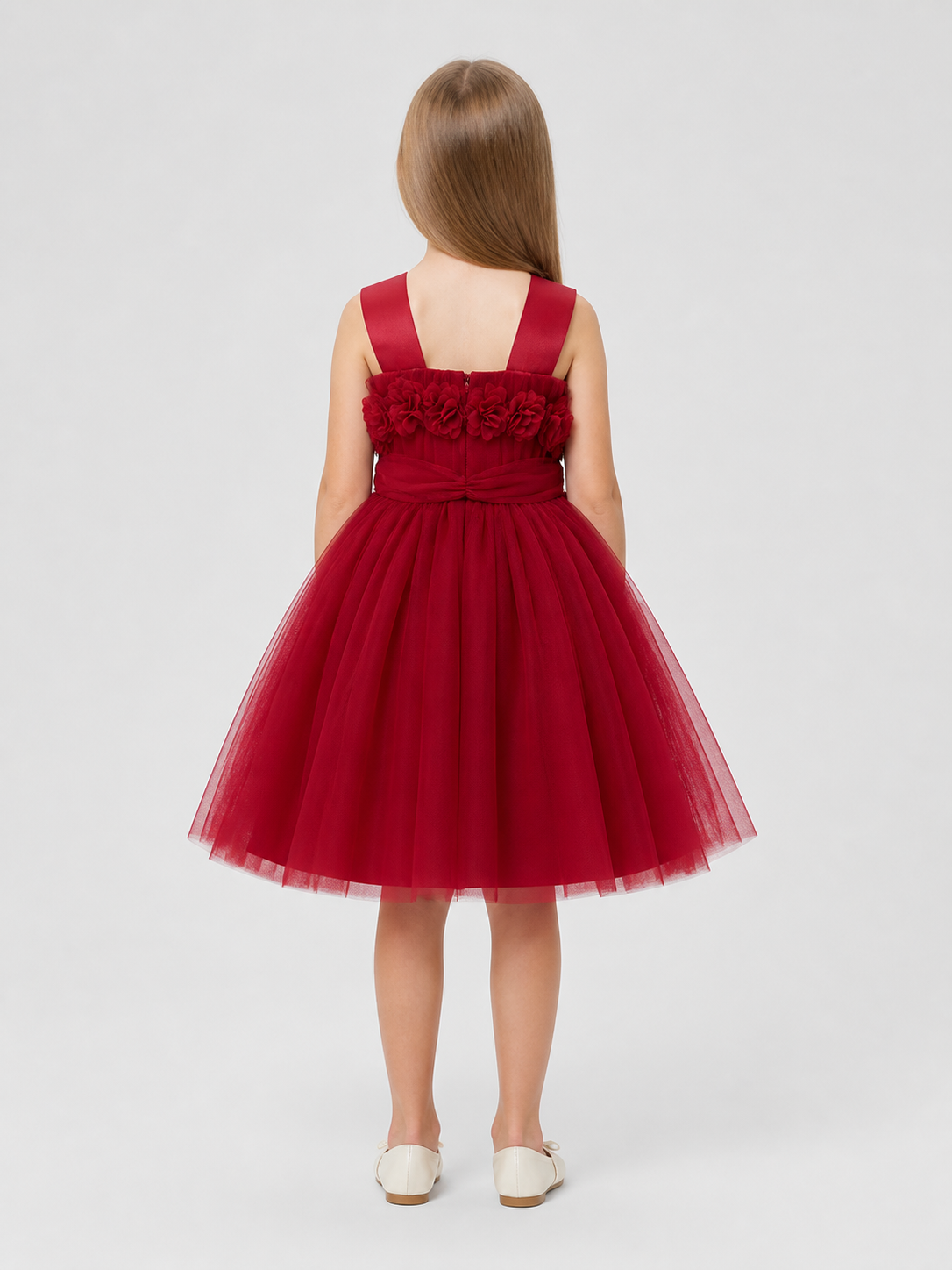 Children’s dressy dress with shoulder straps and a full skirt back view