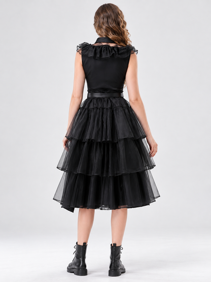 Black sleeveless dress with ruffles and a tiered skirt