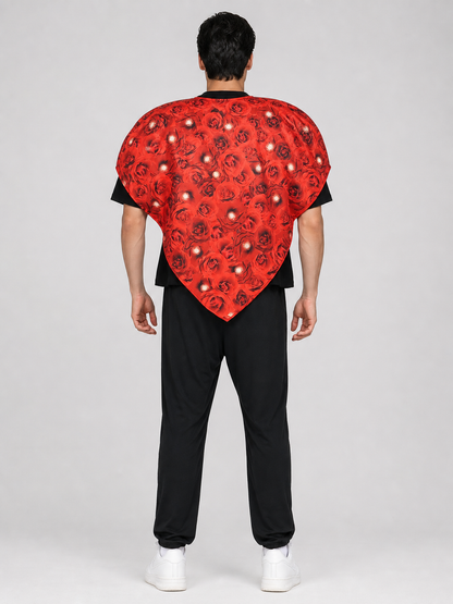 Bright heart-shaped costume with a floral print. A voluminous silhouette with a pointed lower edge and wide short sleeves that extend from the sides of the garment. The surface is decorated with an allover floral pattern reminiscent of rose