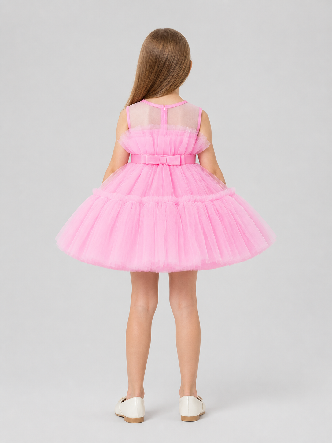 Puffy Pink Dress with a Layered Skirt and Bow back view