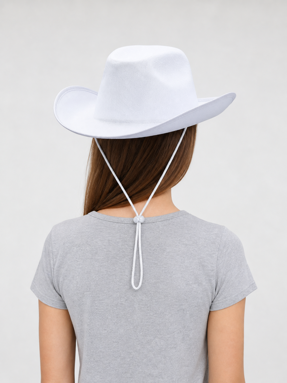 White Cowboy Hat with a Wide Brim and Chin Tie