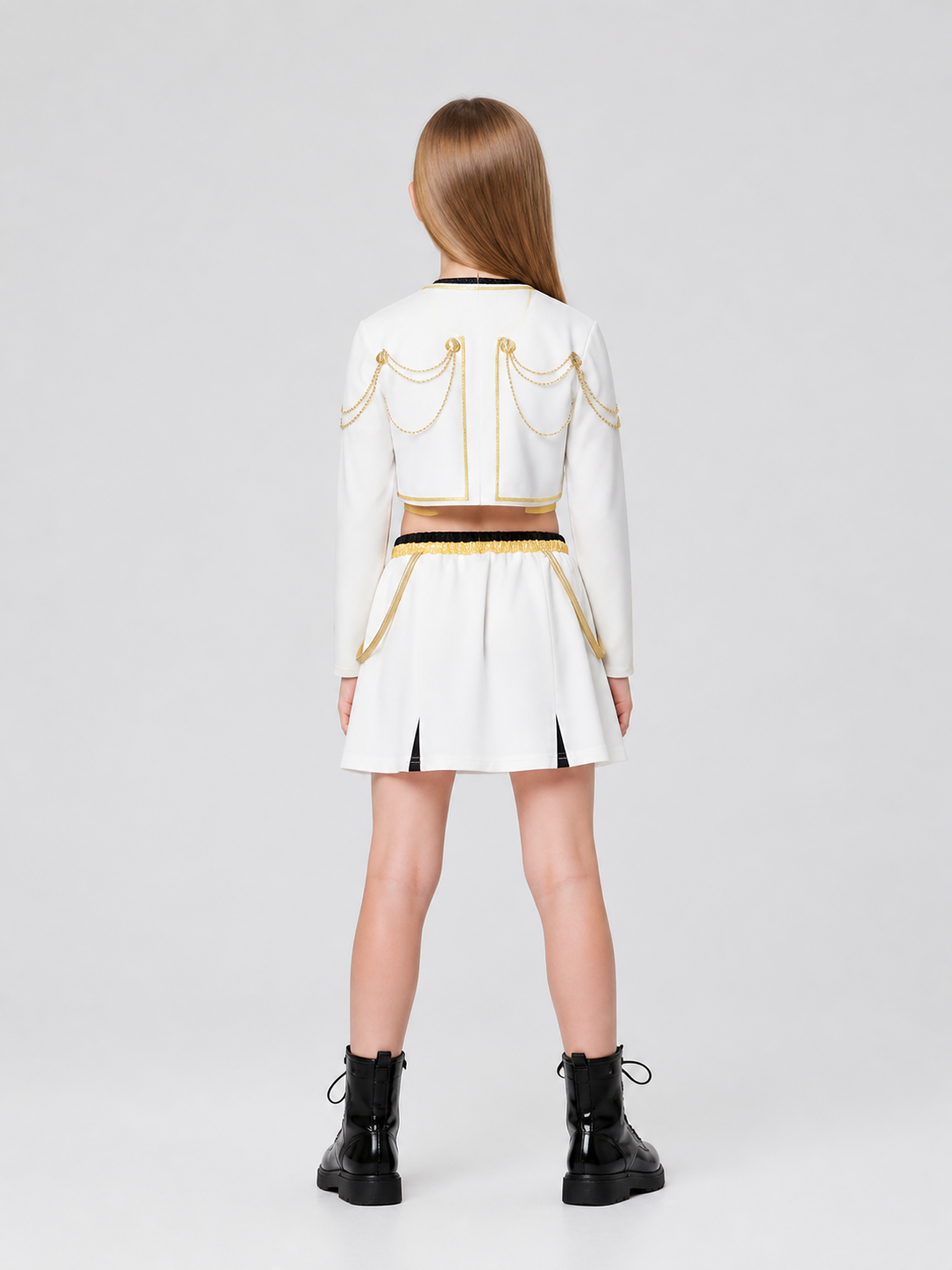 Children’s stage costume, white, black, and gold, 3 pieces back view