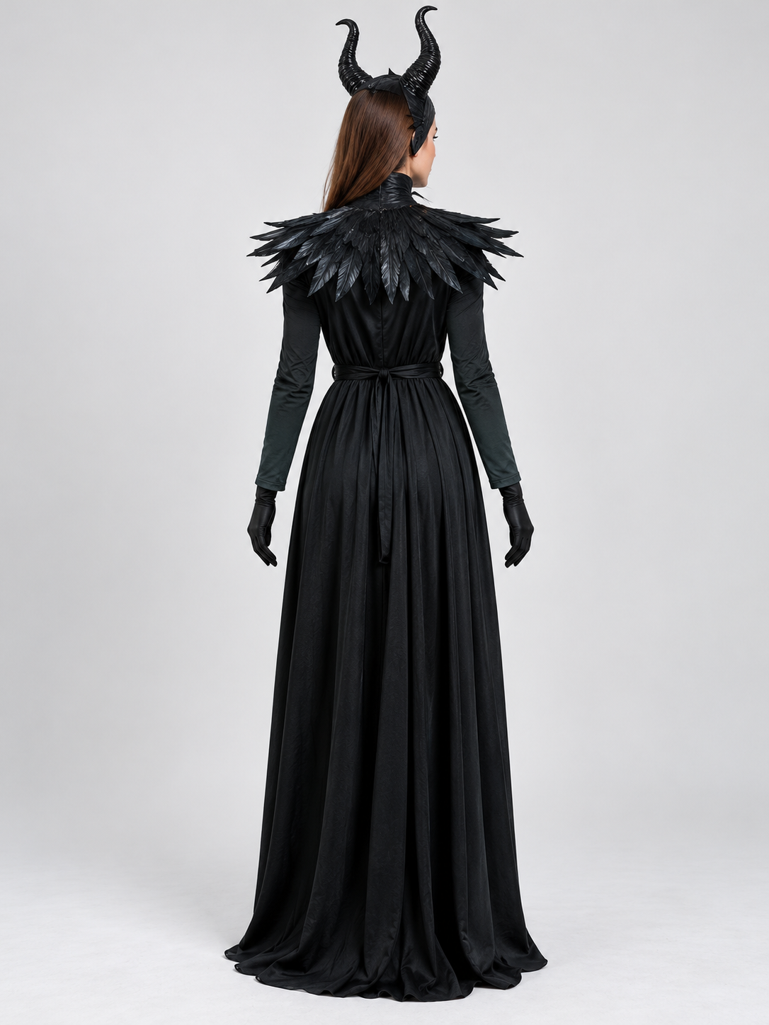 Witch costume: long black floor-length dress, feathers, horns