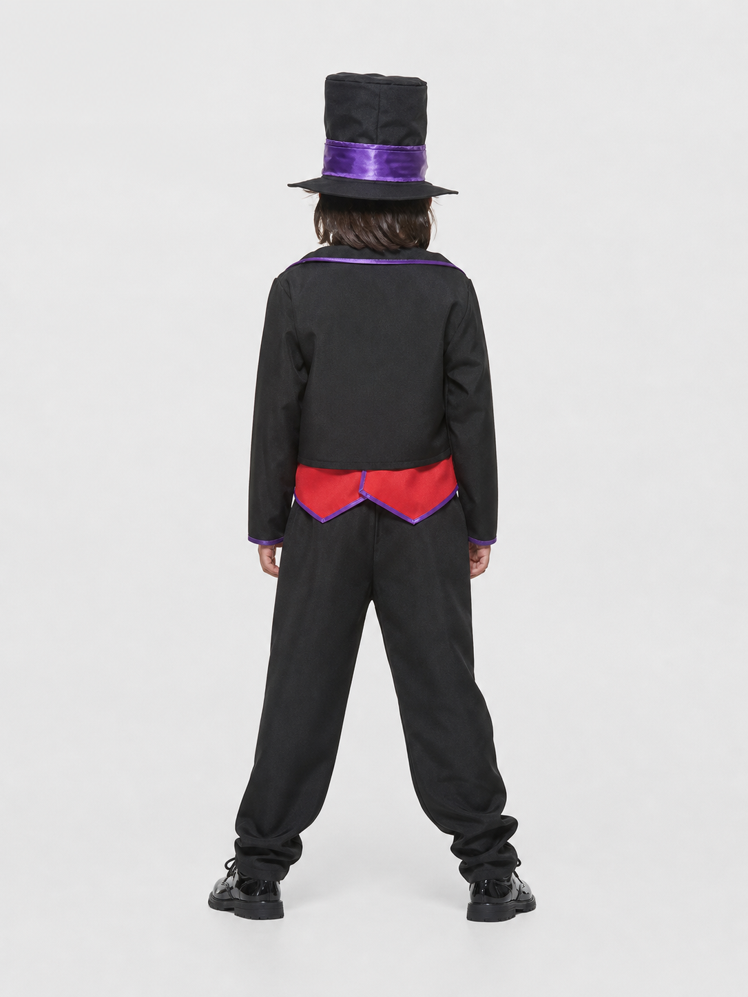 This skeleton costume is designed in the Mexican style of the Day of the Dead celebration. The outfit includes a black jacket with purple trim and floral decorations, a red vest-style front panel with decorative buttons, a red bow tie, blac