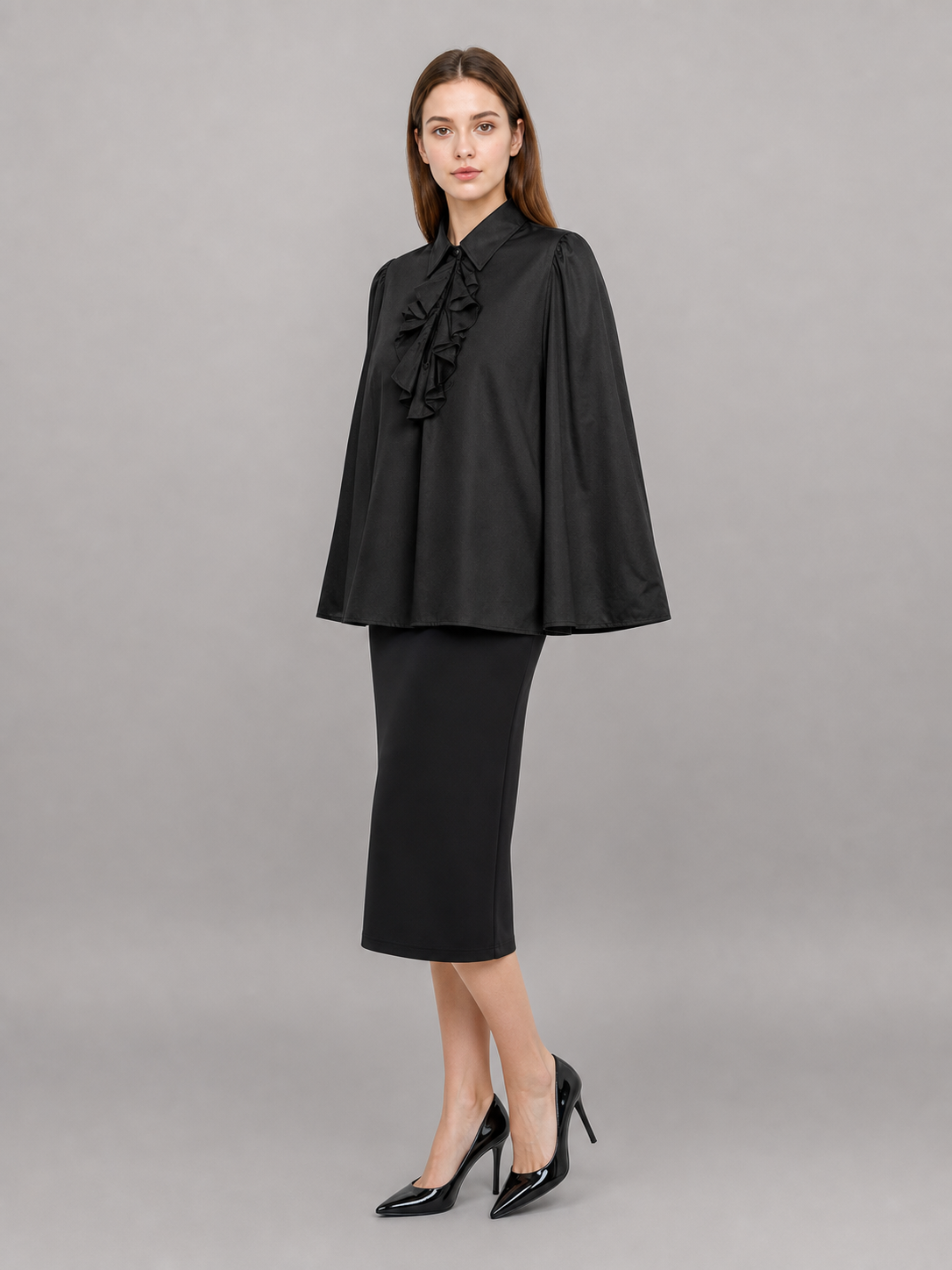Black blouse with a high collar and ruffle