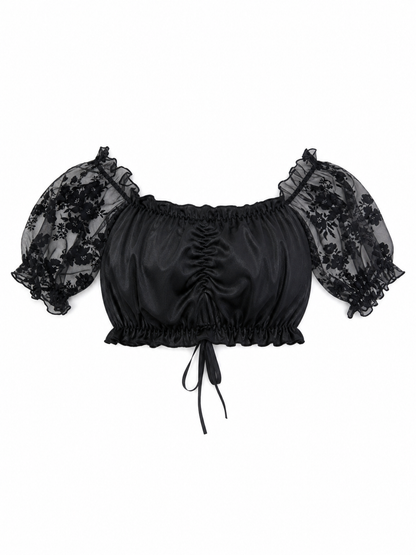The blouse is black: the main body is made of opaque, smooth fabric