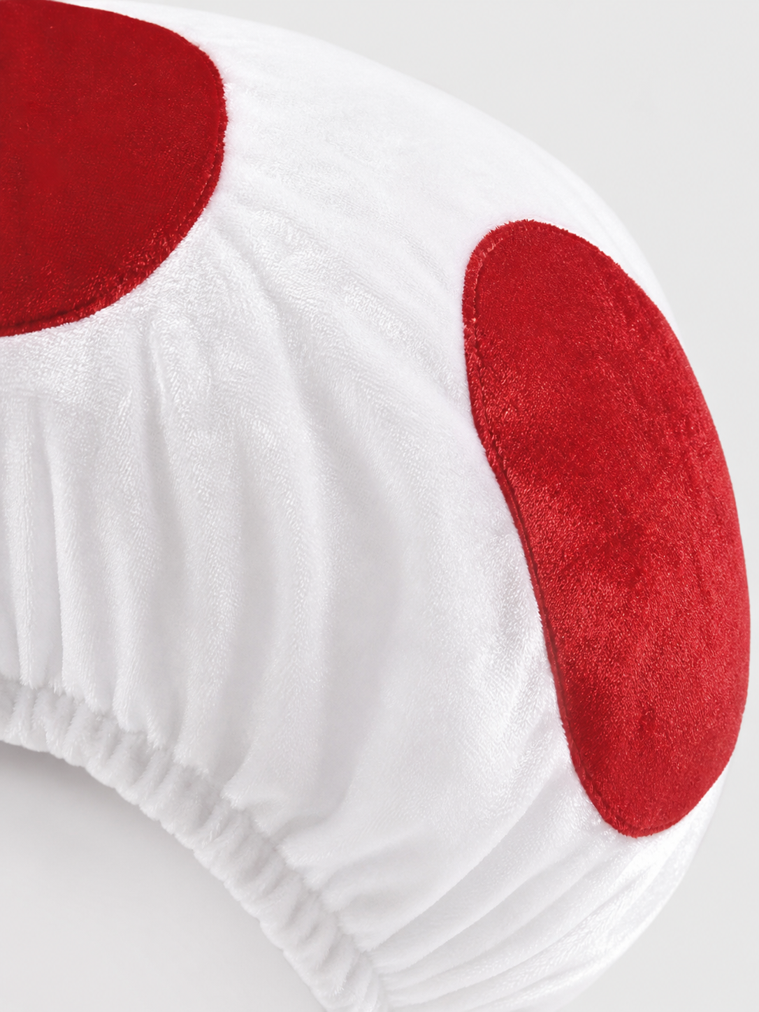 An unusual mushroom-shaped headpiece will be a noticeable detail of a costume, themed party, or stage look. The design has a playful style and resembles a large mushroom hat: a rounded, voluminous crown with a full gathered shape and a wide