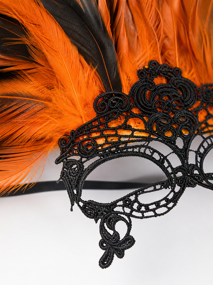 Carnival headdress with feathers and a mask