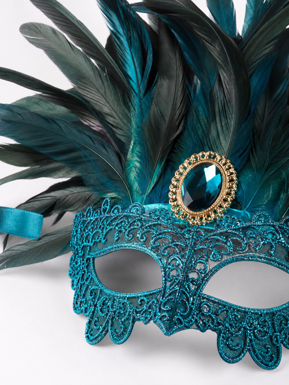 Carnival headpiece with feathers and a mask