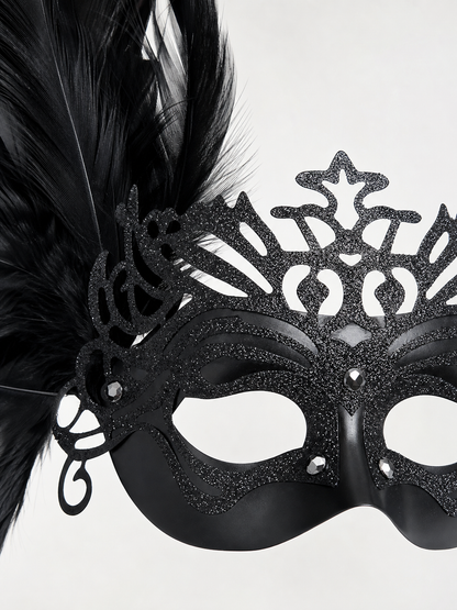 Carnival headpiece with black feathers and a mask