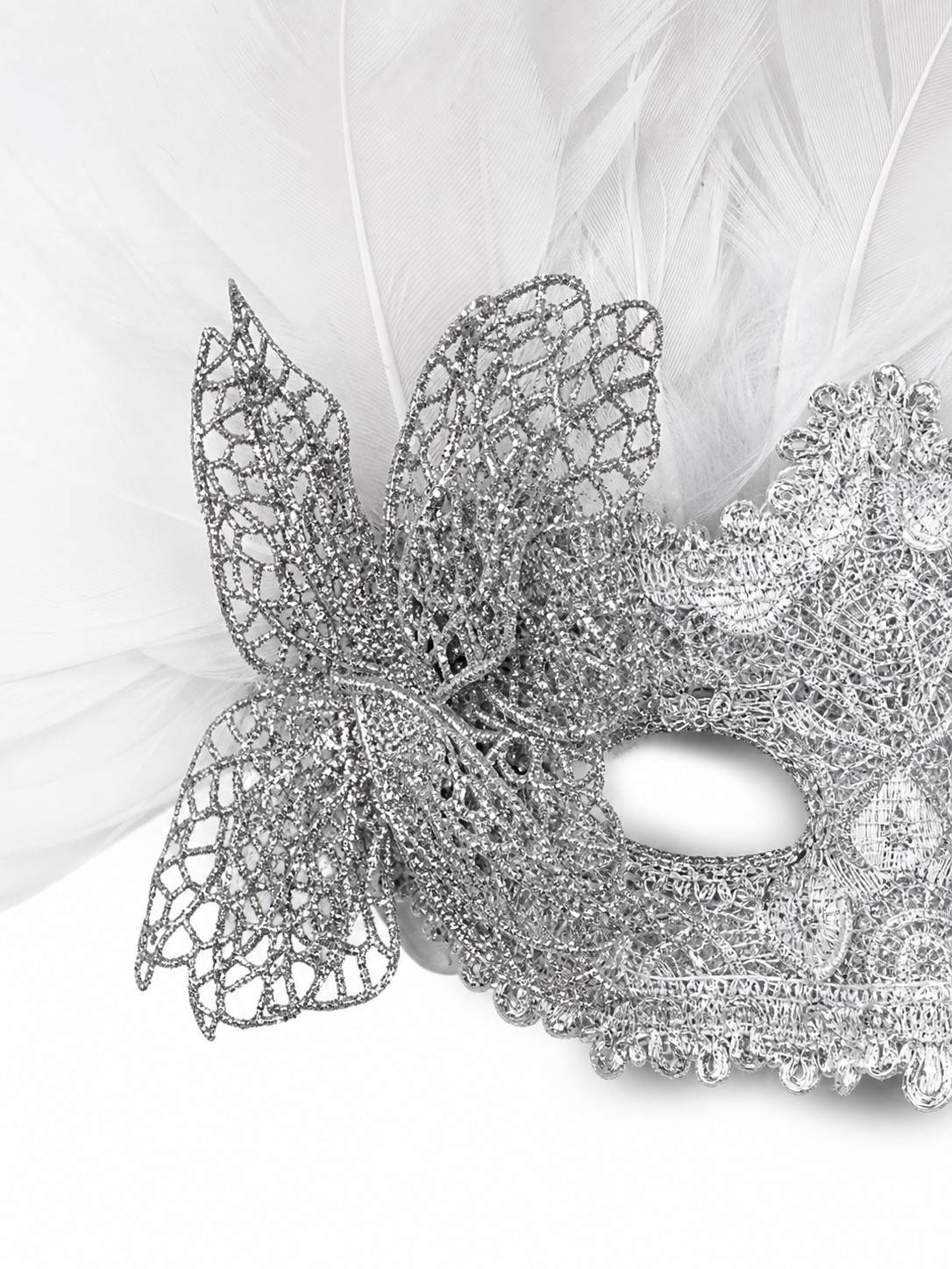 Carnival mask with white feathers and embellishments