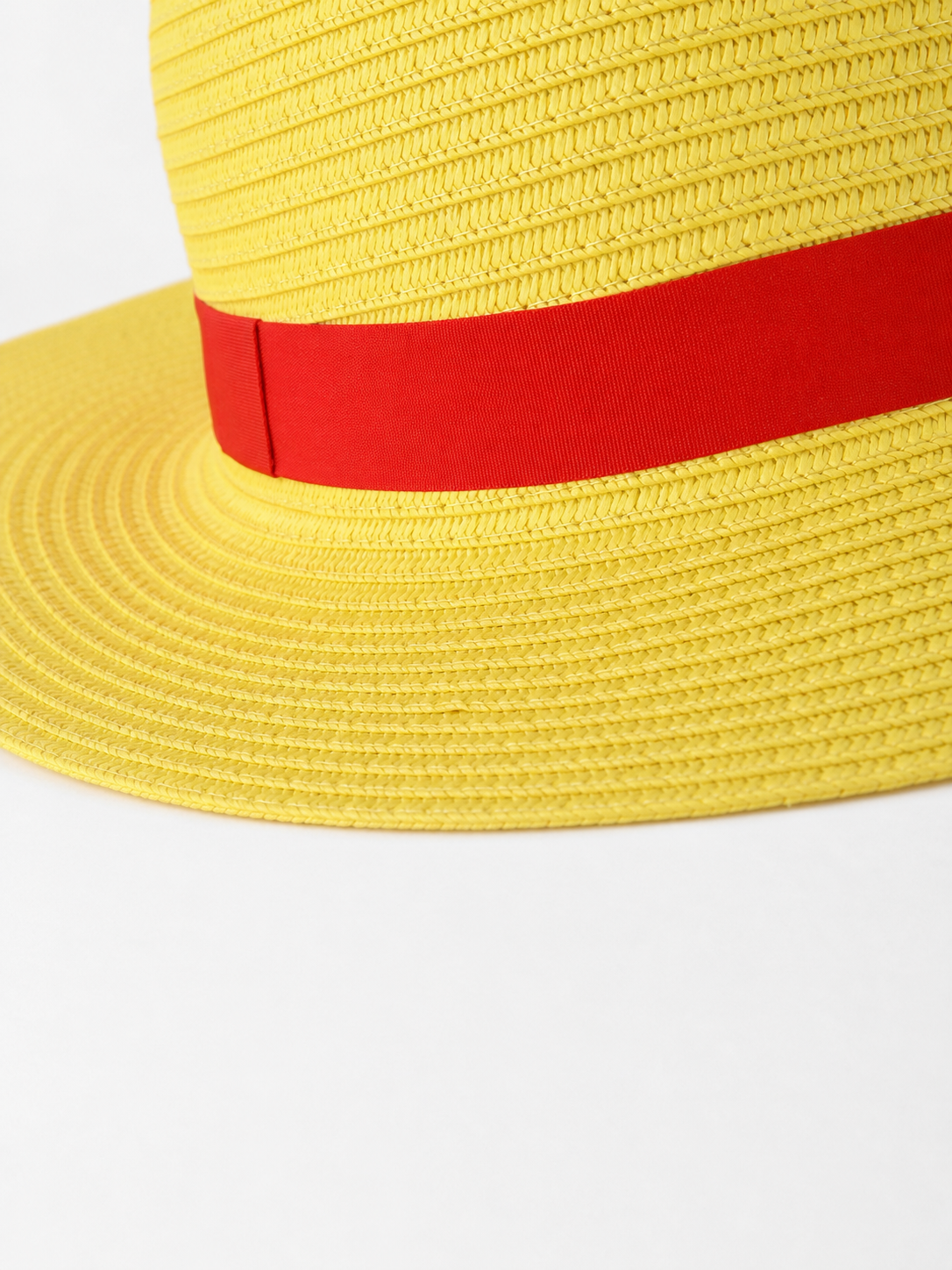 Carnival hat with a red ribbon and cord