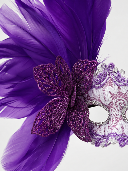 Carnival headdress with feathers and a mask