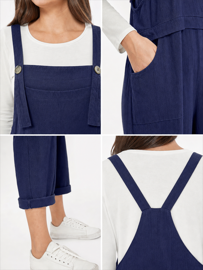 Loose-fit dark navy bib overalls with straps and pockets