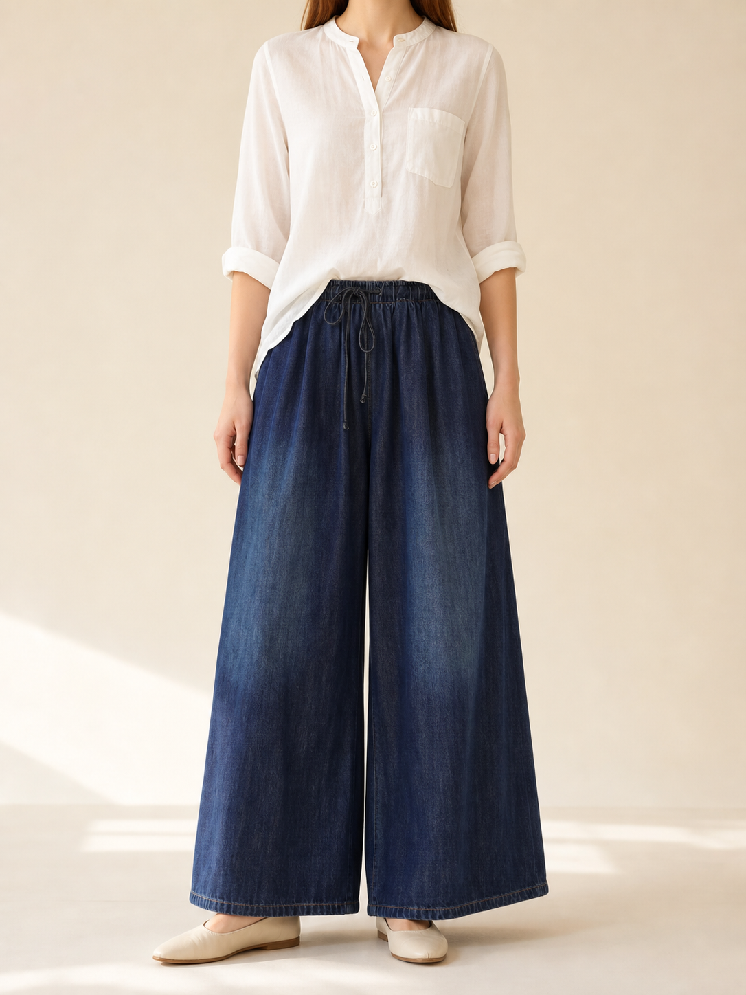 Women's high-waisted palazzo jeans with a drawstring