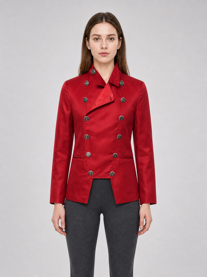 The jacket is presented in a vintage red color and designed in a military style with elements of Gothic aesthetics. The model features a distinctive front construction with a diagonal wrap, giving the garment a bold character. A double row 