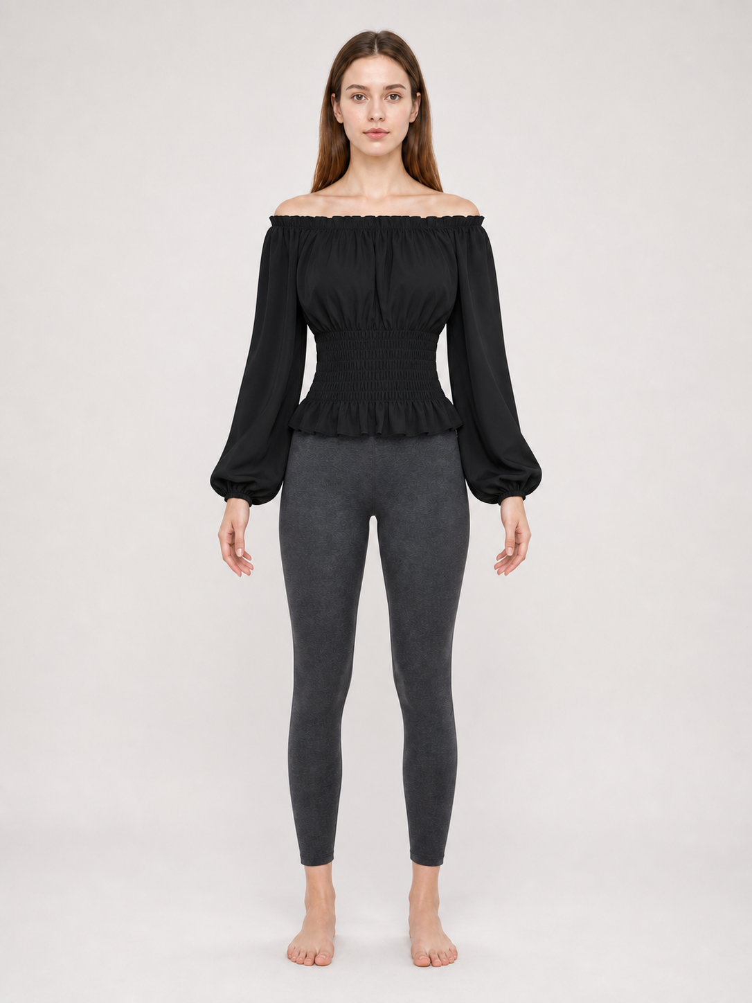 Black off-the-shoulder blouse with ruffles