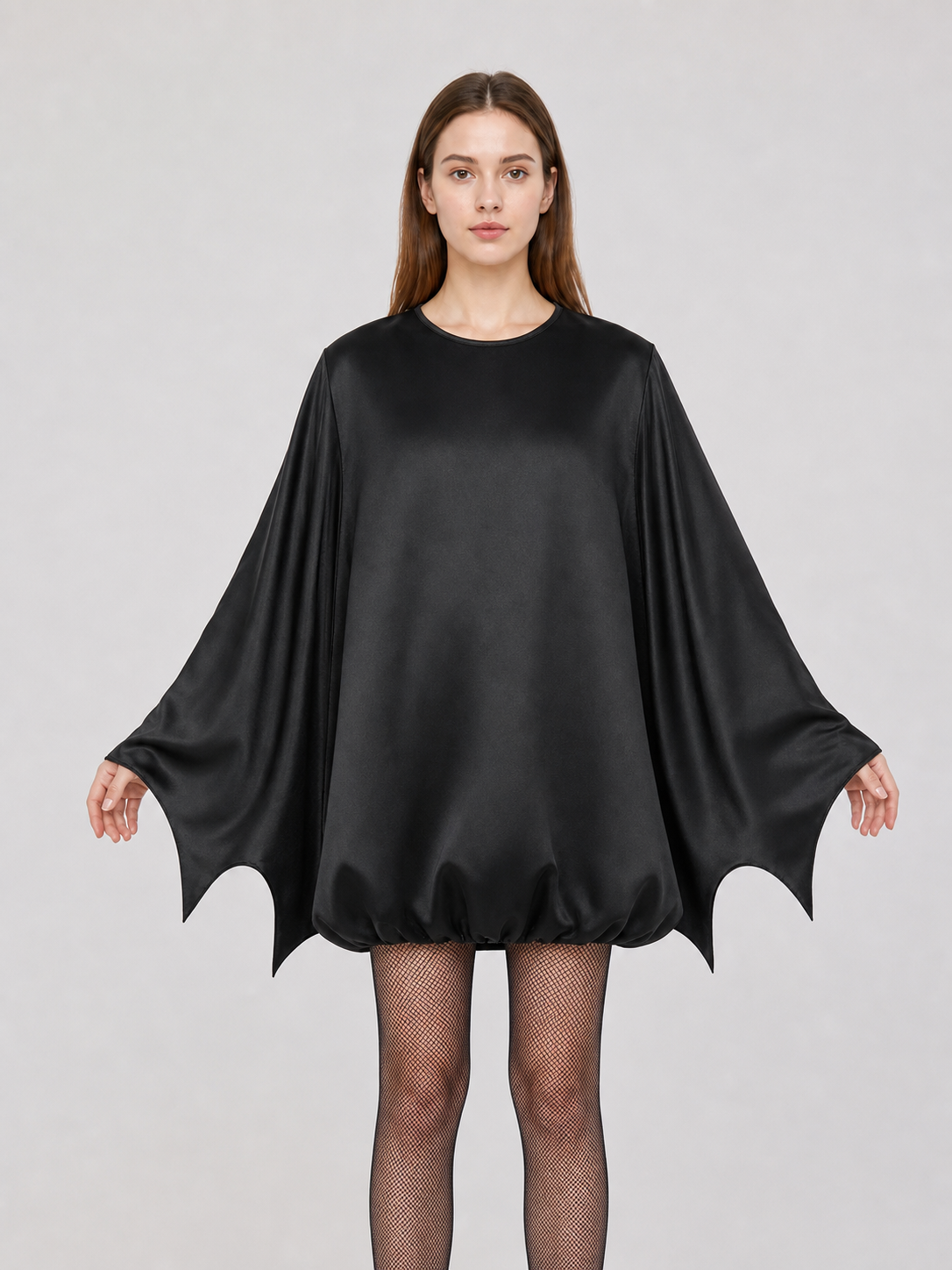 Black bat costume dress with a headband and ears for themed events. The design front view