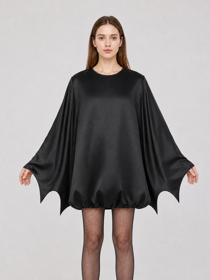 Black bat costume dress with a headband and ears for themed events. The design front view