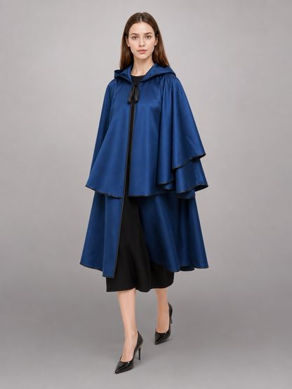 Blue hooded carnival cloak with black trim