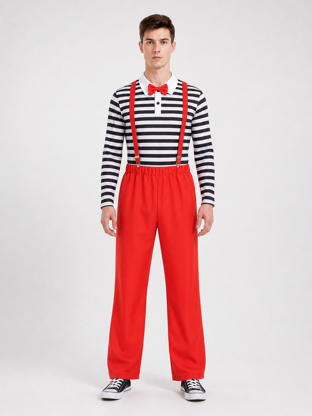 This bright clown costume is designed to create an expressive stage look and a festive transformation. The set includes a red cap with a short protruding crown, round glasses with red frames, a long-sleeve shirt with horizontal black-and-wh