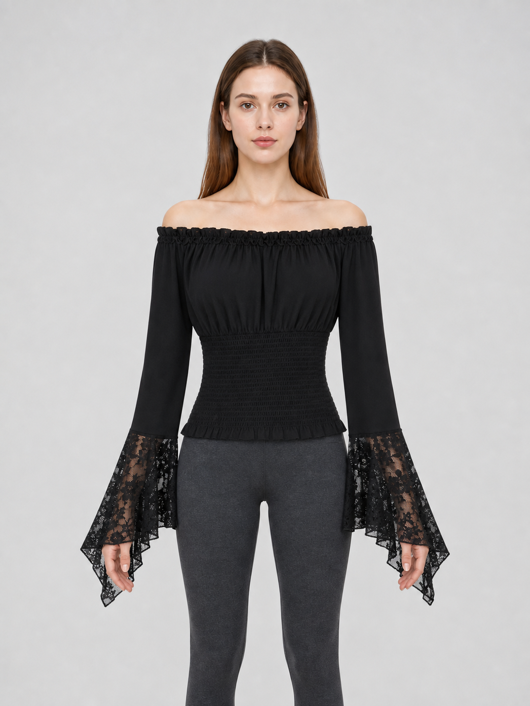 Black off-the-shoulder blouse with ruffles and long sleeves