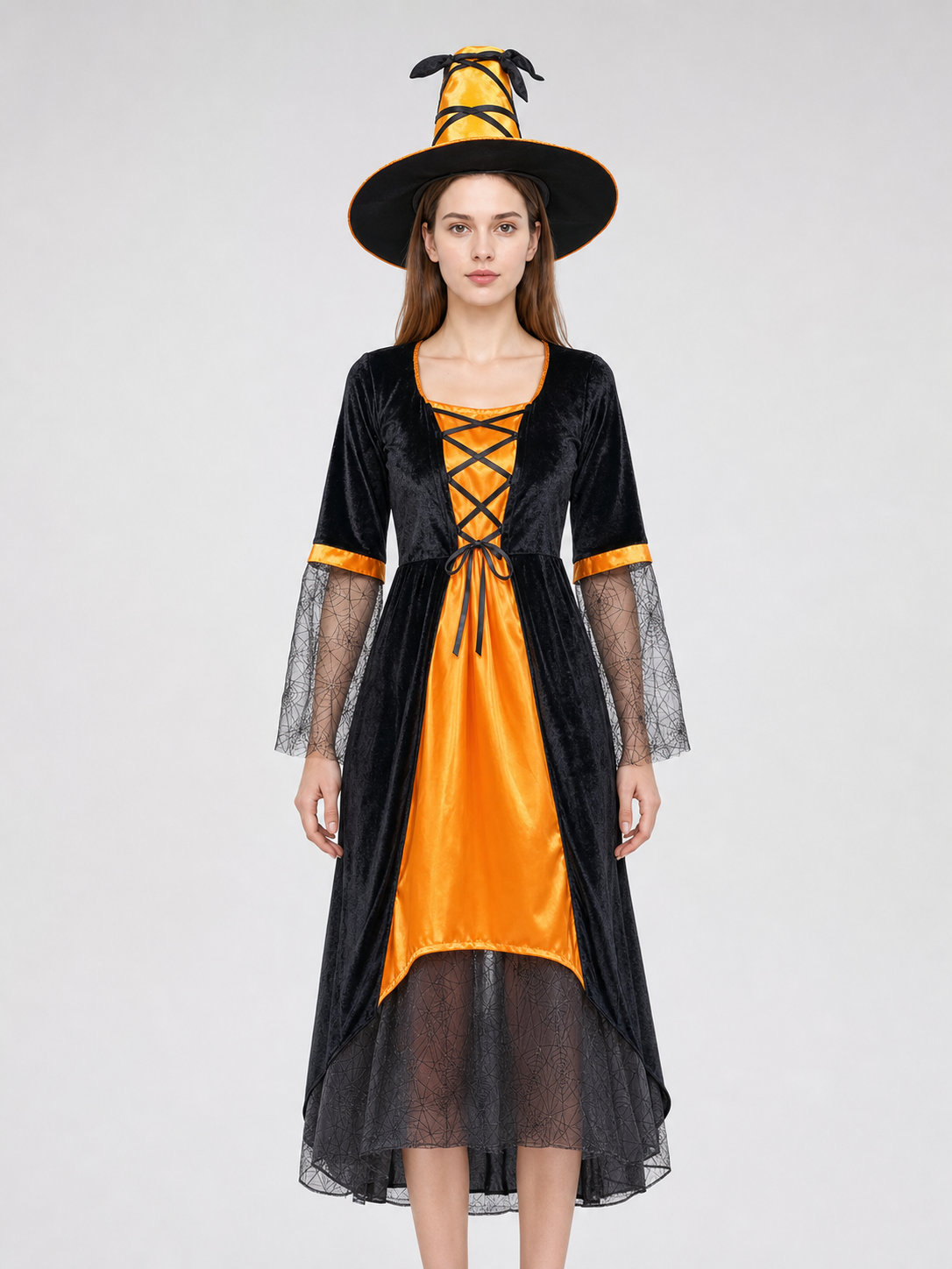 This Halloween costume includes a long dress and a pointed hat. The dress is in a black-and-orange color scheme: the center features a bright orange panel, and the black outer layer has a flared hem. The semi-sheer sleeves are decorated wit