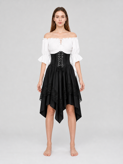 The set is designed in a theatrical pirate style and consists of a white cropped off-the-shoulder top with voluminous puff sleeves, a black corset with front lacing and metal eyelets, and a black asymmetrical skirt with elongated pointed pa