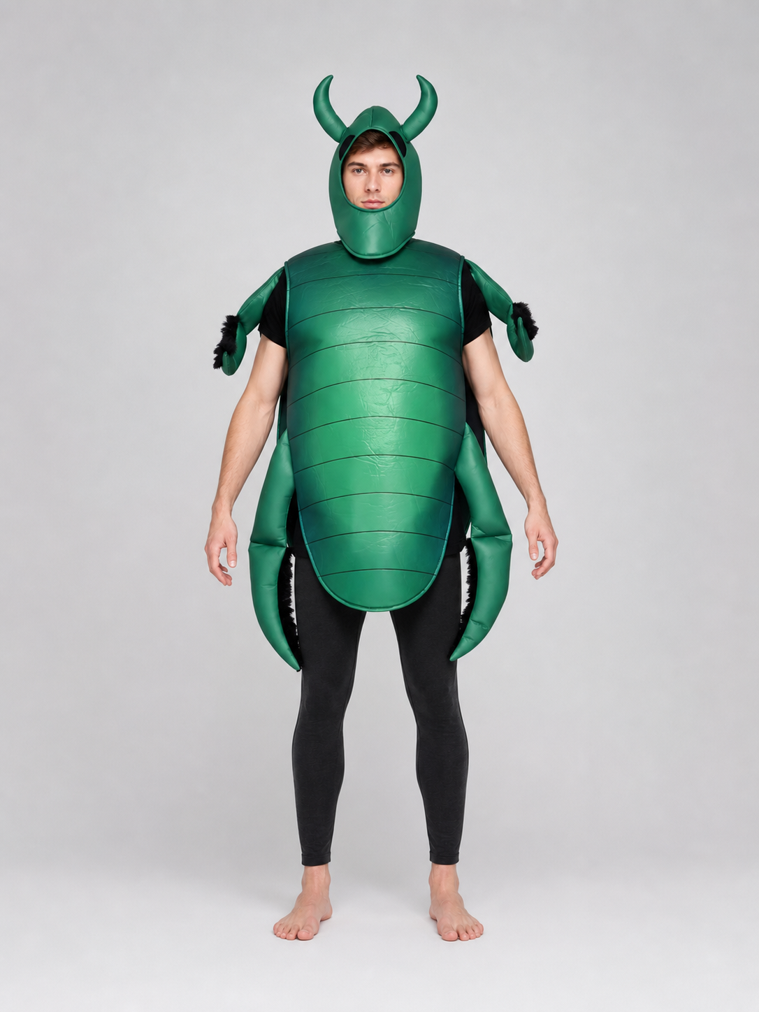 The beetle costume features a full-body insect silhouette with a large segmented green panel on the abdomen. The look is completed by a curved headpiece resembling horns, along with green side and hand elements that imitate insect limbs. Th